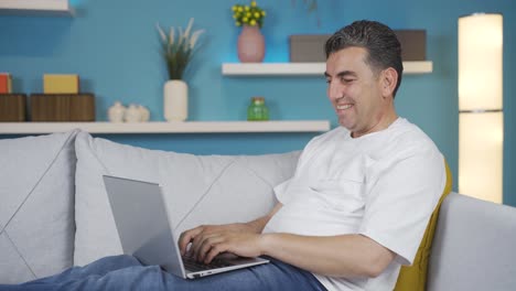 Man-chatting-on-laptop-at-home.